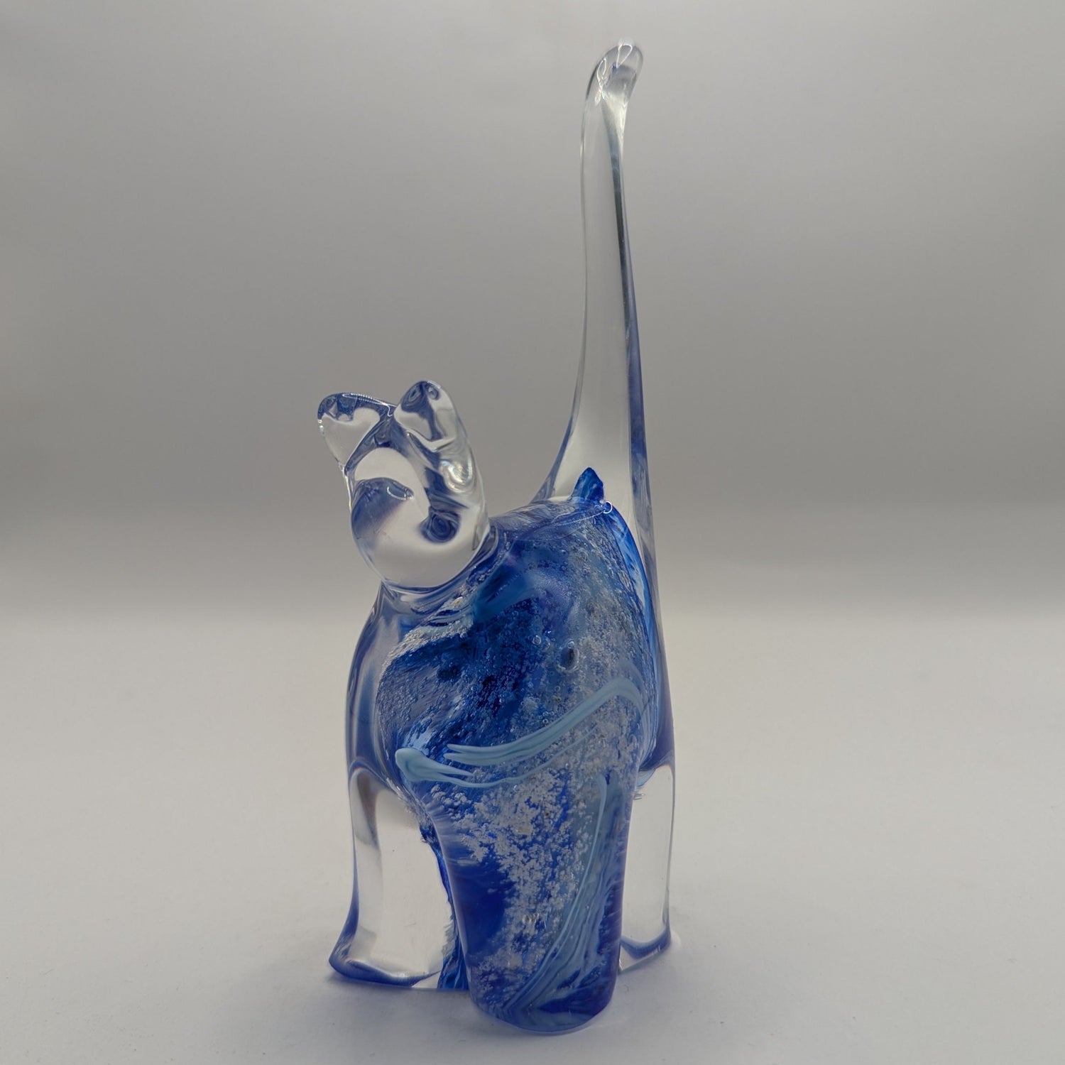 Royal blue cat sculpture with ashes