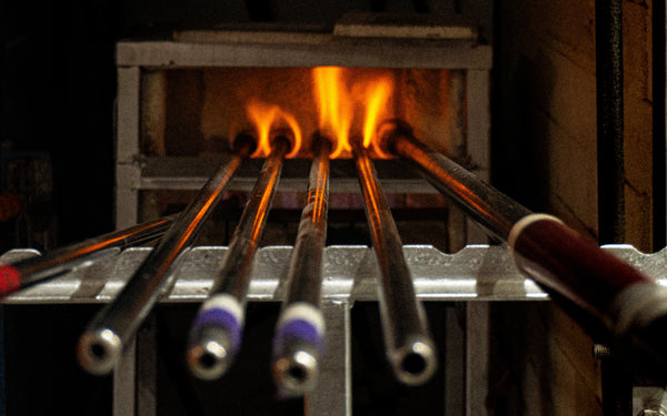 Glassblowing sticks in the fire