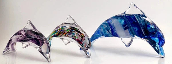 Glass dolphin sculptures