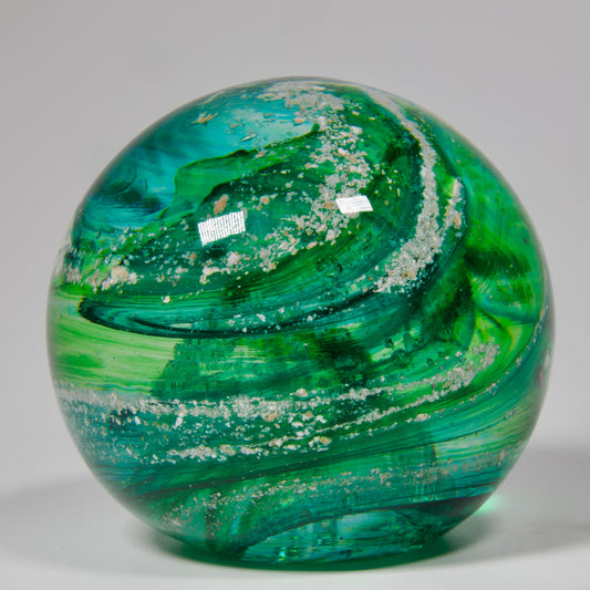 Ashes into glass round paperweight